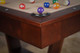 Close-up of the genuine leather drop pockets on the Zoey Slate Pool Table, highlighting the fine craftsmanship. Close-up of the genuine leather drop pockets on the Zoey Slate Pool Table, highlighting the fine craftsmanship.